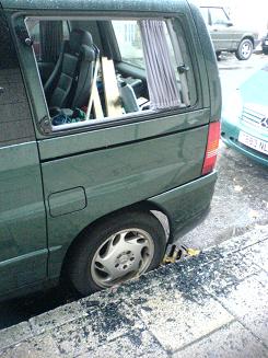 Smashed window in van